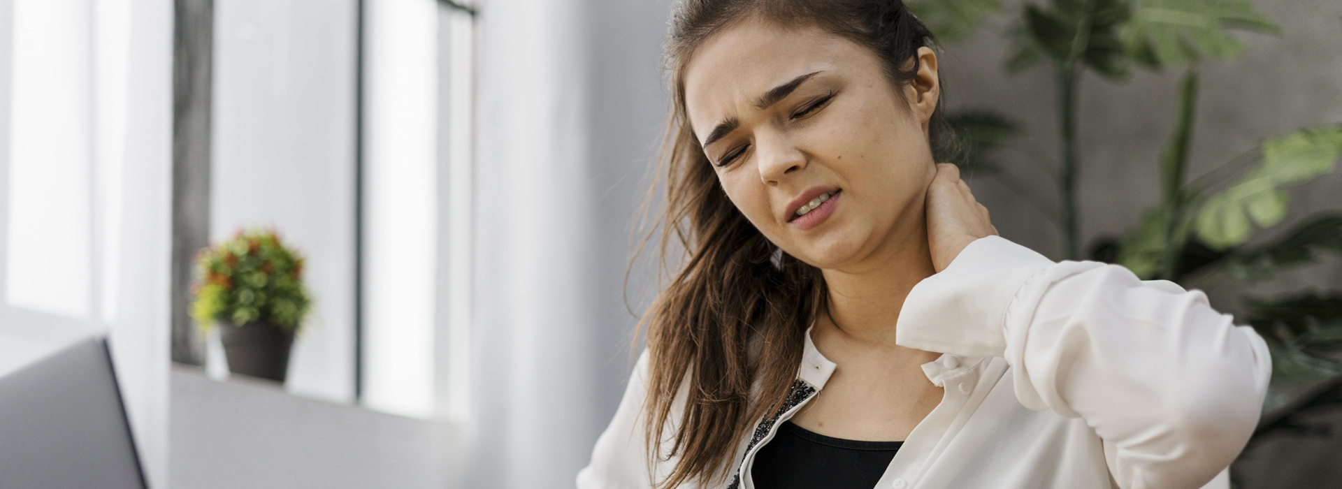 office worker with neck pain